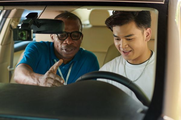 Experienced Right Route mentor guiding a new driving instructor